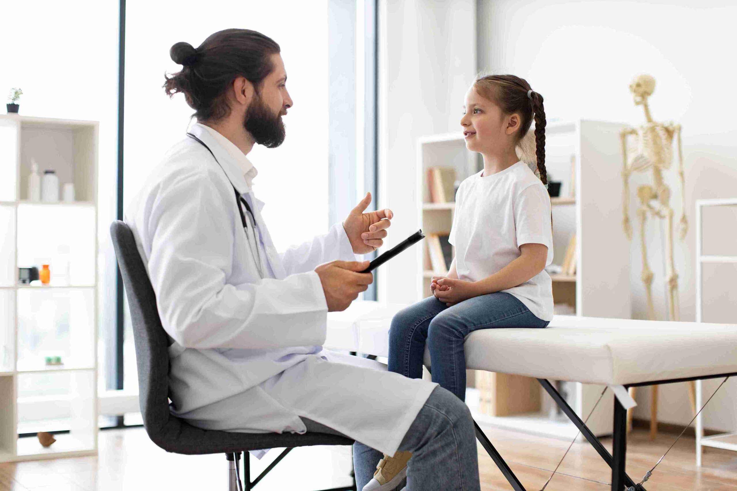 doctor speaking with a child patient
