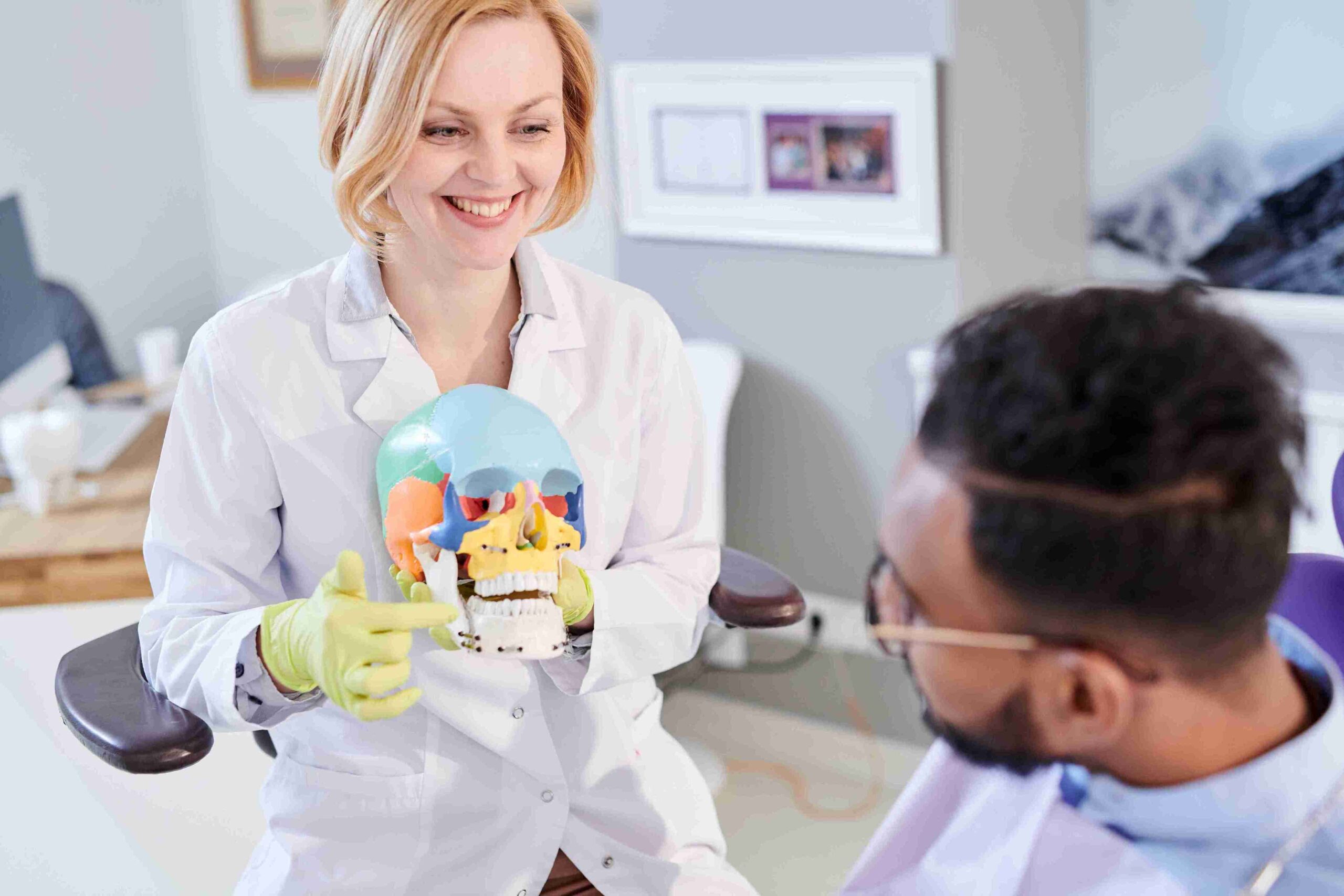 dentist explaining something to a patient
