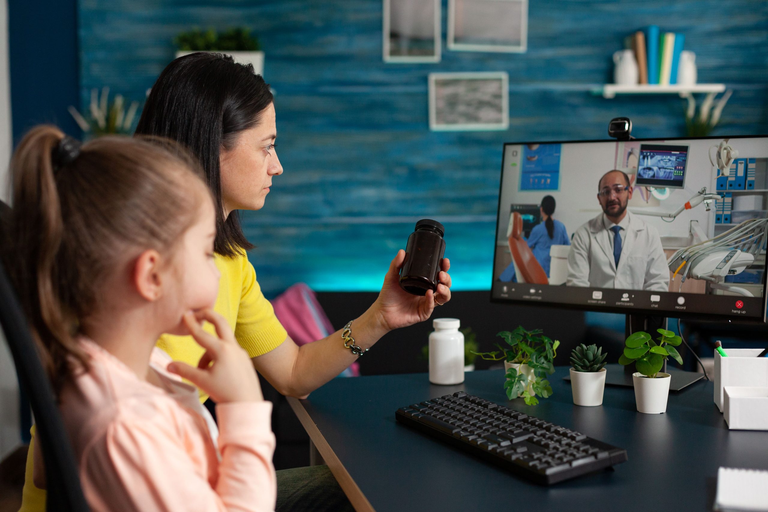 mother and child doing telemedicine
