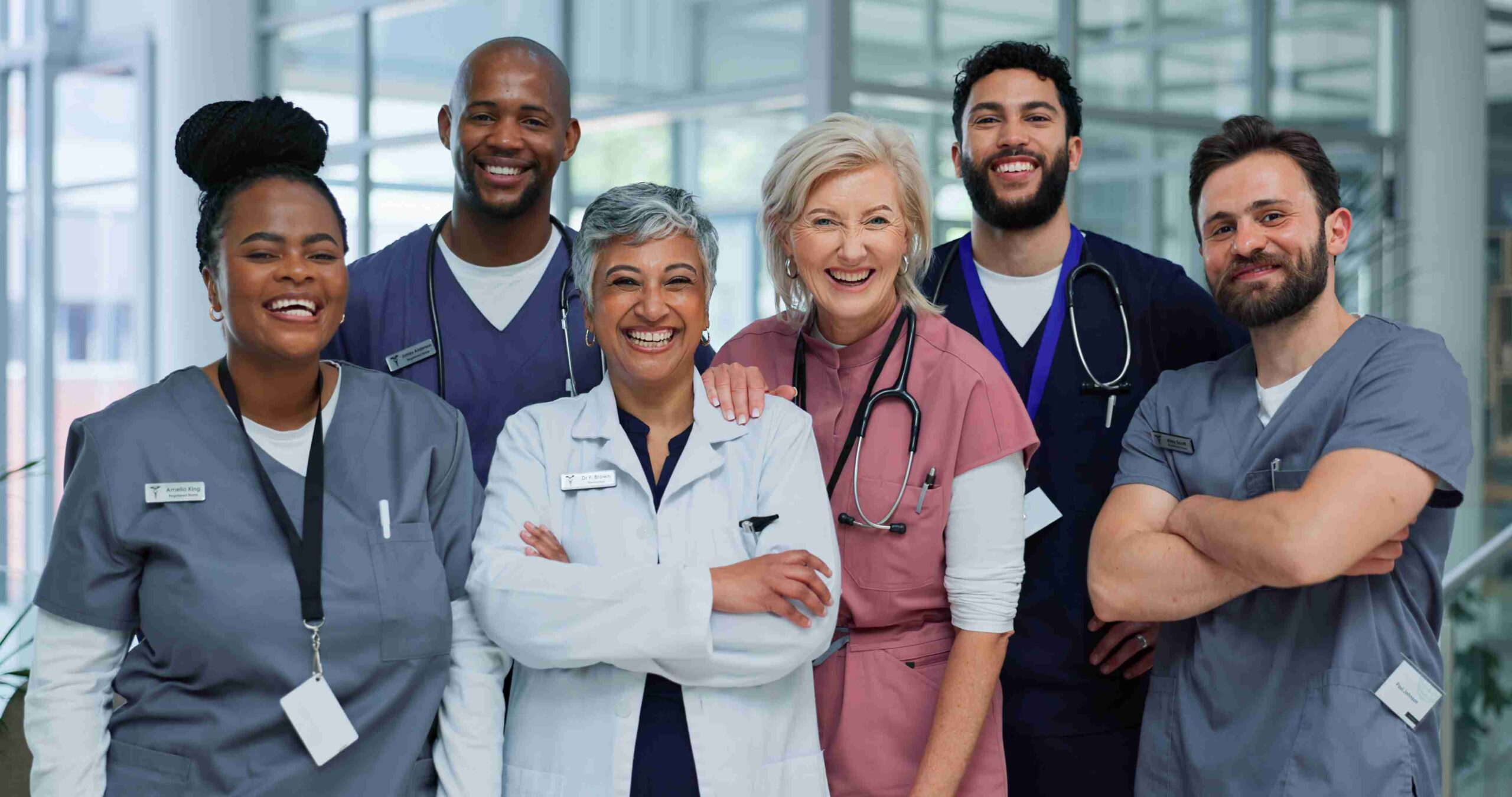 healthcare workers smiling at the camera