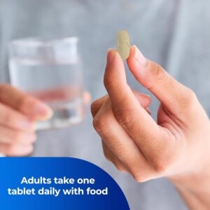 One A Day Men’s Multivitamin Tablet being held by a hand 