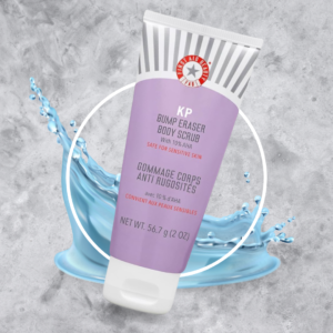 First Aid Beauty - KP Bump Eraser Body Scrub in front of water splash