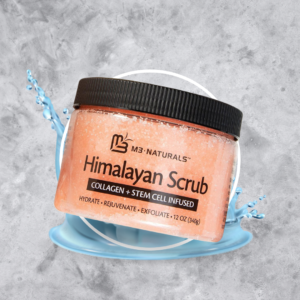 M3 Naturals Himalayan Salt Scrub in front of a water splash