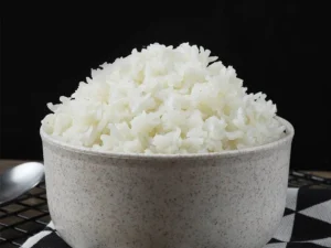 A bowl filled with fluffy, freshly cooked white rice