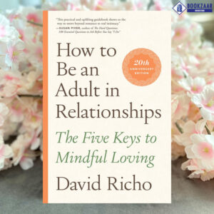 how to be an adult in a relationship book on a table and prompt up by white flowers