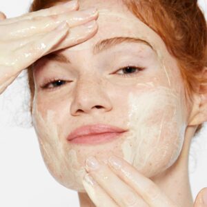 dermalogica face scrub being used by a woman