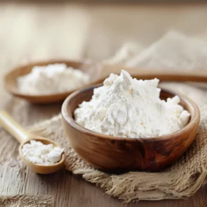 a bowl and spoon full of powdered form glutathione